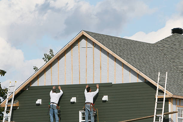Professional Storm Damage Siding Repair technician working in Jamestown, NC